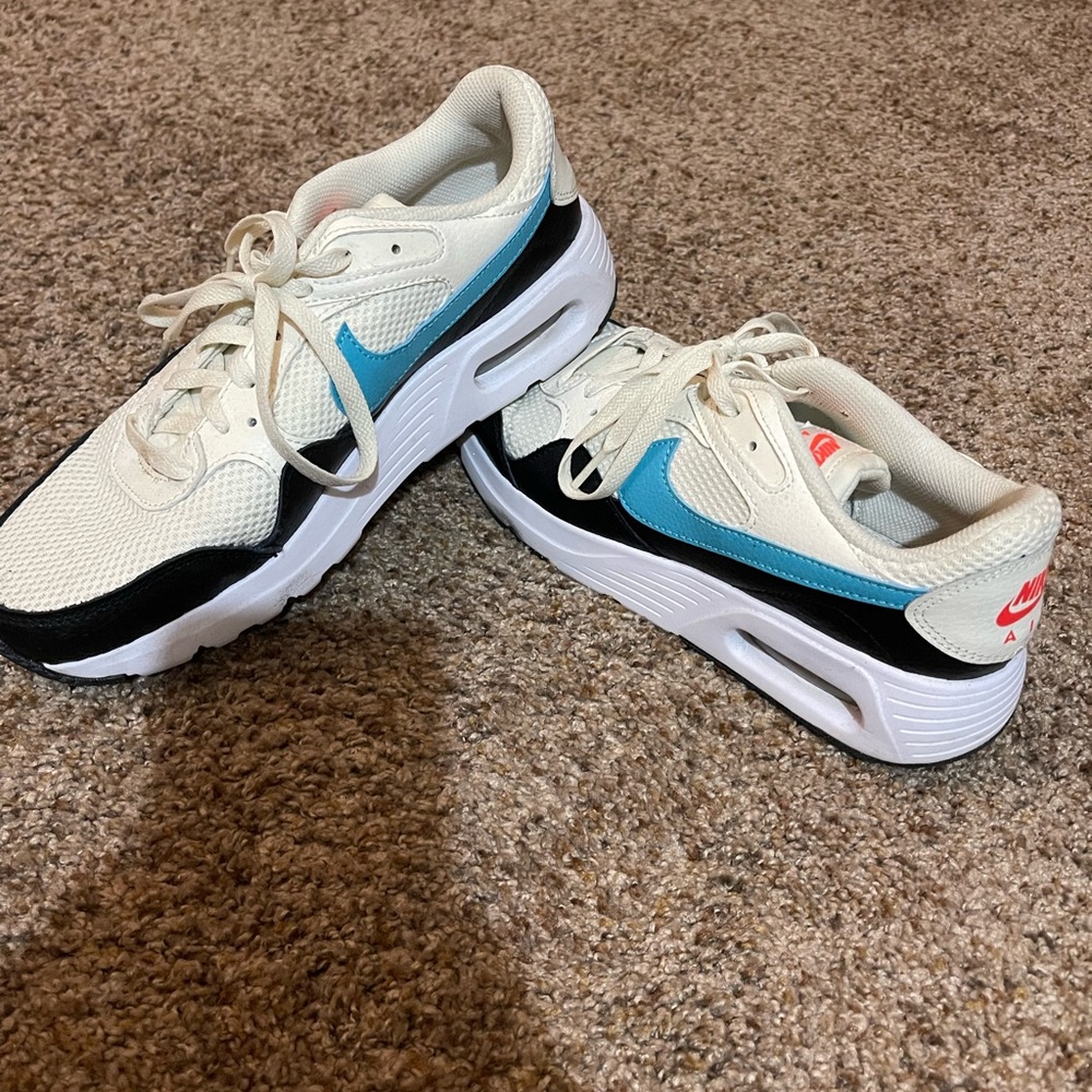Nike Athletic Shoes in Cream, Blue, and Black